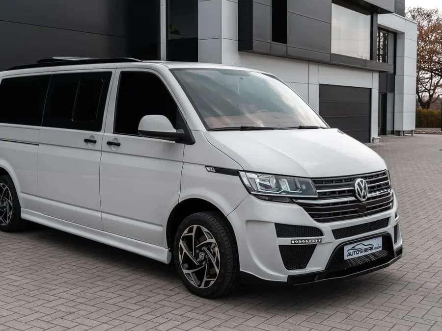 White small courier van on a city street