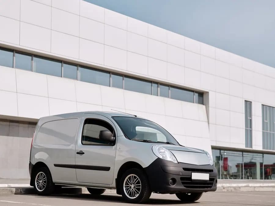 White extra-long courier van fleet