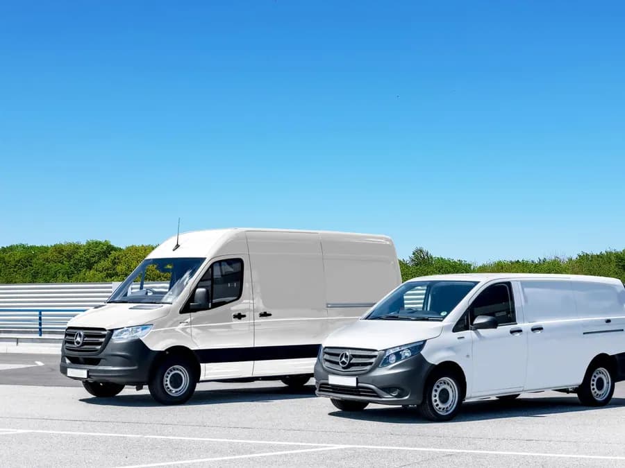 White long-wheelbase delivery vans