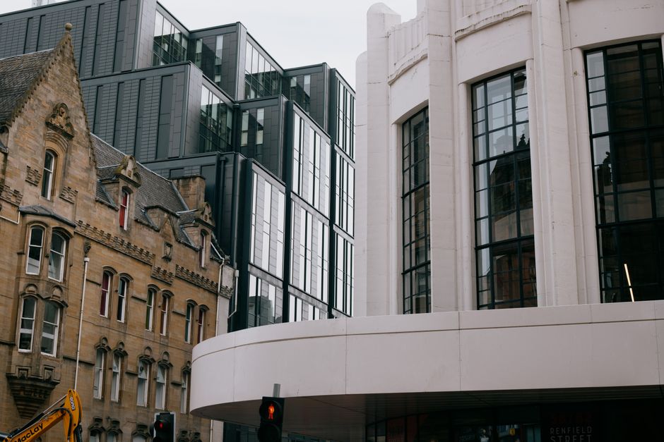 Same day courier van and skyline in Glasgow